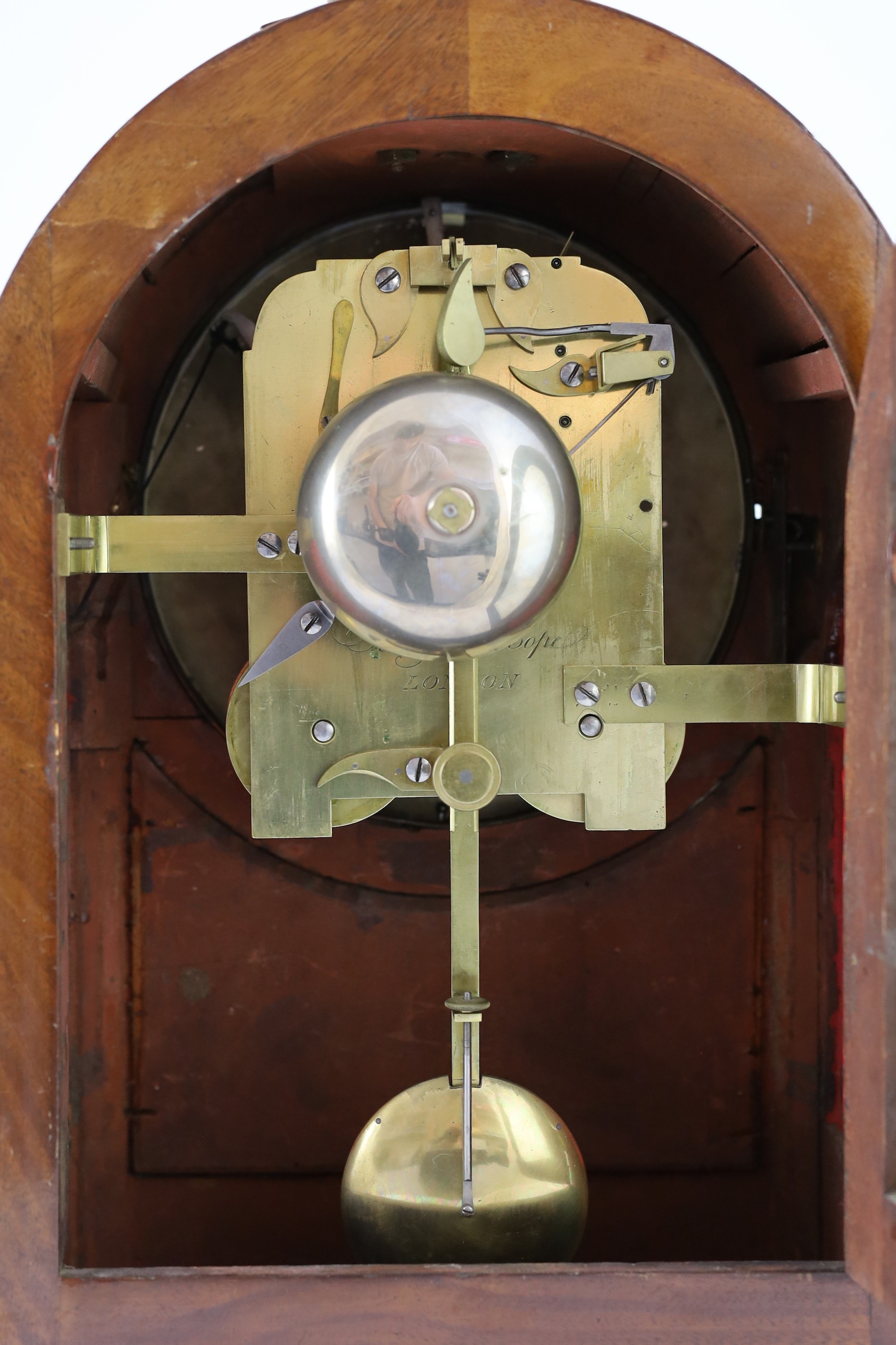 Molyneux & Cope of London. A Regency brass inset repeating bracket clock, 30cm wide 17cm deep 46cm high